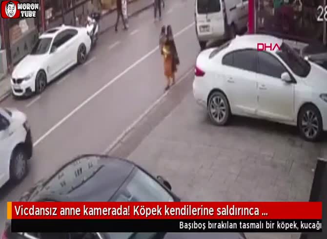 Video :Attacked by a dog, she runs away, leaving her child behind